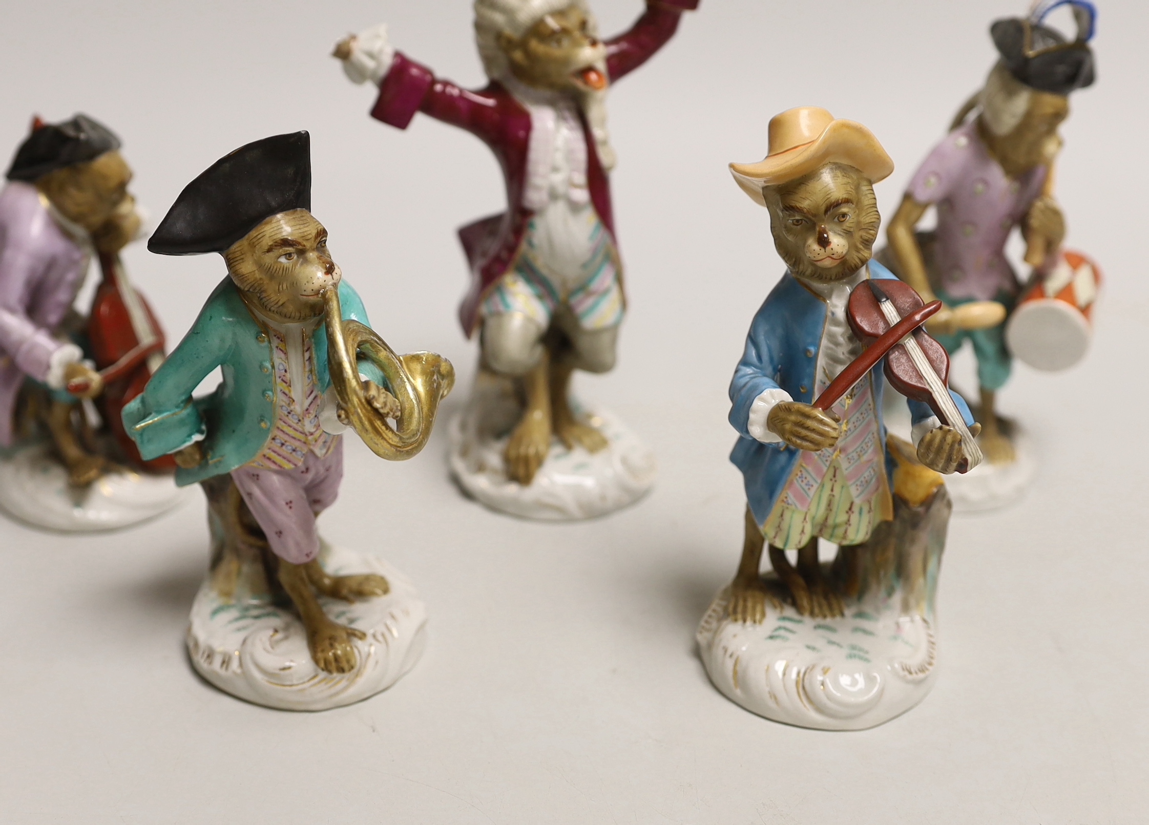 Five Volkstedt porcelain monkey band figures, tallest 17cm